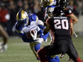 Winnipeg Blue Bombers wide receiver Darvin Adams runs in a touchdown during the first half against the Ottawa Redblacks at TD Place on Friday, Oct. 5, 2018.