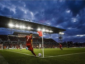 Toronto FC's Victor Vazquez takes a corner kick against the Chicago Fire during an MLS soccer match in Toronto on July 28. Maple Leaf Sports & Entertainment is moving to improve the much-maligned playing surface at BMO Field. A new grass surface will be laid next month, with improved lighting and irrigation. And in April, the field will be strengthened by artificial fibres that will hold the surface together, protect the grass and reduce recovery time between events.