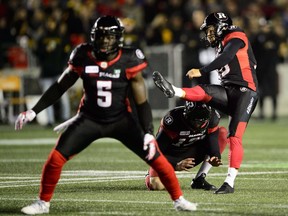 Ottawa Redblacks kicker Lewis Ward (10) kicks for a field goal while taking on the Hamilton Tiger-Cats during first half CFL action on Friday, Oct. 19, 2018, breaking the pro football record for consecutive field goals made.