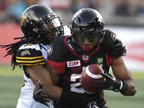 Mossis Madu Jr., churning for extra yards against his former team, the Tiger-Cats, last season, will likely be making his first start of the year for the Redblacks in Hamilton on Saturday with William Powell out.  CANADIAN PRESS FILES