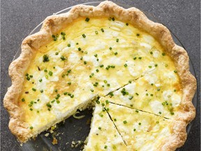 This undated photo provided by America's Test Kitchen in October 2018 shows a leek and goat cheese quiche in Brookline, Mass. This recipe appears in the cookbook "ATB Brunch." (Daniel J. van Ackere/America's Test Kitchen via AP) ORG XMIT: NYTK105