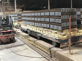 These unfired bricks are piled on rolling racks that enter the kiln with temperatures as hot as 1100ºC. The firing process takes hours to produce a brick that can stand up to Canadian winters.