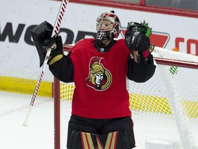 Ottawa Senators goaltender Craig Anderson celebrates in his crease in the final seconds of third period NHL action against the Dallas Stars Monday October 15, 2018 in Ottawa.