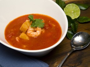 Thai squash and garlic soup can be garnished with grilled jumbo shrimp. (Mike Hensen/The London Free Press)