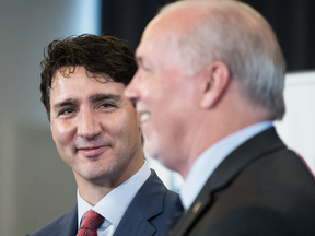 Prime Minister Justin Trudeau with B.C. Premier John Horgan during an LNG Canada news conference in Vancouver on Oct. 2, 2018.