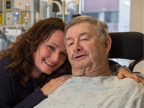 Leo Muldoon, who was blown off his barn roof during the Sept. 21 tornado, is seen here at the Ottawa Hospital, Civic Campus with daughter Melanie Armstrong.  Wayne Cuddington/Postmedia