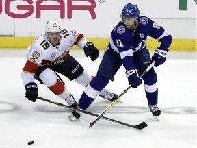 Florida Panthers defenceman Mike Matheson (19), in action here against the Tampa Bay Lightning on Oct. 6, was suspended for two games on Monday for a hit against the Vancouver Canucks' Elias Petterson in a subequent contest.