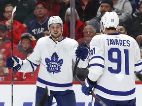 The Toronto Maple Leafs' Auston Matthews, left, celebrates his goal with John Tavares on Thursday, Oct. 11, 2018, in Detroit.