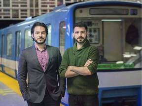 Frederic, left, and Etienne Morin-Bordeleau, co-founders of Project MR-63 pose next to a Montreal Metro, Saturday, October 14, 2016. As Montreal's original subway cars are being gradually pulled out of service, at least a few of the 50-year-old cars will be getting second lives.