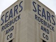 A sign for a Sears department store is displayed in Hackensack, N.J., Monday, Oct. 15, 2018. Sears filed for Chapter 11 bankruptcy protection Monday, buckling under its massive debt load and staggering losses.