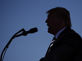 President Donald Trump speaks at Elko Regional Airport, Saturday, Oct. 20, 2018, in Elko, Nev., during a campaign rally.
