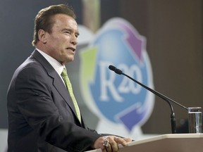 FILE - In this May 15, 2018 file photo, Arnold Schwarzenegger delivers a speech during the R20 Austrian world summit at the Hofburg palace Vienna, Austria. Schwarzenegger said he "stepped over the line several times" with women. In an interview released Tuesday, Oct. 9 in Men's Health, the actor and former Republican governor of California said he was the "first one to say sorry." Schwarzenegger said he feels bad about it and apologies.