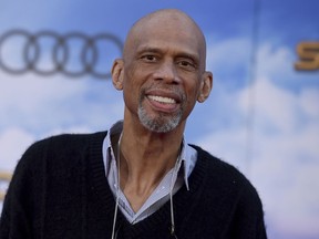 FILE - In this June 28, 2017 file photo, former NBA star Kareem Abdul-Jabbar arrives at the Los Angeles premiere of "Spider-Man: Homecoming" at the TCL Chinese Theatre in Los Angeles. Abdul-Jabbar and tennis great Billie Jean King are lending their names to Athlete Ally, a nonprofit targeting homophobia in sports.