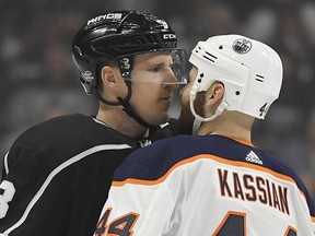 Los Angeles Kings defenceman Dion Phaneuf and the Edmonton Oilers' Zack Kassian face off.