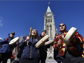 Drummers welcome marchers with the Moose Hide Campaign to Parliament Hill. The campaign raises awareness of the problem of violence against women in Canada, particularly against Indigenous women and girls.