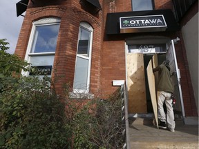 Ottawa Compassion Clinic, 487 Rideau St. was boarded up then opened at 9am.