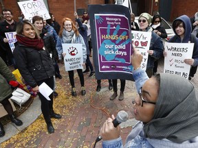 Mostly union workers protest on Somerset Street in Ottawa Wednesday Oct 24, 2018. A rally was held in protest of Premier Doug Ford's repeal of Bill 148, which will prevent minimum wage going up to $15 an hour.