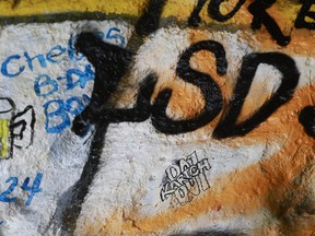 Graffiti with alcohol and drugs themes are seen inside the Corral Canyon Cave in Malibu, Calif.