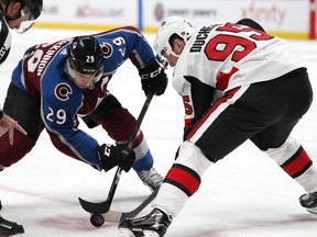 Matt Duchene takes a faceoff against former Colorado Avalanche teammate Nathan MacKinnon in his return to the Pepsi Center on Friday, Oct. 26, 2018, in Denver.