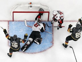 Vegas Golden Knights right wing Alex Tuch, right, celebrates after scoring against Ottawa Senators goaltender Craig Anderson (41) during overtime of an NHL hockey game, Sunday, Oct. 28, 2018, in Las Vegas.