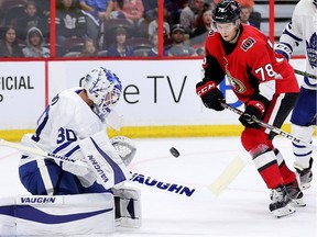 Filip Chlapik pounces on the loose puck and scores on goalie Calvin Pickard.