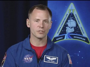 In this frame from video from NASA TV, NASA astronaut Nick Hague, who survived the Oct. 11, 2018, failed launch and emergency landing, speaks Tuesday, Oct. 16, 2018, from the NASA Johnson Space Center in Houston. Hague and Russian Alexei Ovchinin were two minutes into their flight last Thursday from Kazakhstan to the International Space Station when the Soyuz rocket failed.