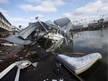 A boat sits amidst debris in the aftermath of Hurricane Michael in Mexico Beach, Fla., Thursday, Oct. 11, 2018.