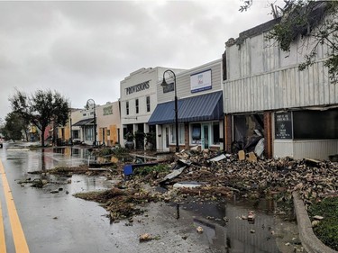 Hurricane Michael formed off the coast of Cuba carrying major Category 4 landfall in the Florida Panhandle. Surge in the Big Bend area, along with catastrophic winds at 155mph. Port St. Joe Lodge number 111, at right, lay in ruins on Reid Avenue on Wednesday, Oct. 10, 2018, in Port St. Joe, Fla., after Hurricane Michael made landfall in the Florida Panhandle. (Douglas R. Clifford/The Tampa Bay Times via AP) ORG XMIT: FLPET110