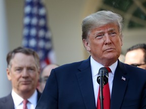 U.S. President Donald Trump pauses while speaking on the U.S.-Mexico-Canada Agreement, or USMCA, in the Rose Garden of the White House in Washington, D.C., U.S., on Monday, Oct. 1, 2018.