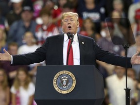 In this June 20, 2018 file photo, U.S. President Donald Trump speaks at a campaign rally in Duluth, Minn.
