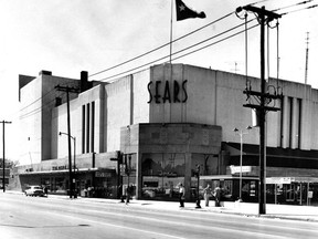 FILE - This March 1, 1959, file photo shows a Sears building in downtown Houston. Sears has filed for Chapter 11 bankruptcy protection Monday, Oct. 15, 2018, buckling under its massive debt load and staggering losses. The company once dominated the American landscape, but whether a smaller Sears can be viable remains in question. (Houston Chronicle via AP, File)