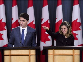 Prime Minister Justin Trudeau and Minister of Foreign Affairs Chrystia Freeland hold a press conference regarding the United States Mexico Canada Agreement (USMCA) at the National Press Theatre, in Ottawa on Monday, Oct. 1, 2018.