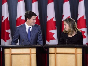 Prime Minister Justin Trudeau and Minister of Foreign Affairs Chrystia Freeland hold a press conference regarding the United States Mexico Canada Agreement (USMCA) at the National Press Theatre, in Ottawa on Monday, Oct. 1, 2018.