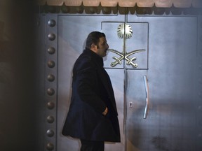 A security personnel stands at the entrance of Saudi Arabia's consulate in Istanbul, Saturday, Oct. 13, 2018.