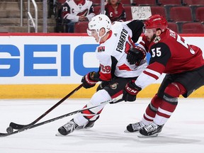 Alex Formenton of the Ottawa Senators skates past the Coyotes' Jason Demers, Oct. 30, 2018.