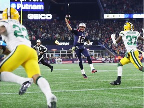 Tom Brady #12 of the New England Patriots throws a pass during the second half against the Green Bay Packers at Gillette Stadium on November 4, 2018 in Foxborough, Massachusetts.