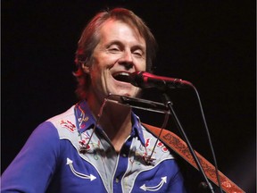 Jim Cuddy performs at the "After the Storm" concert at TD Place arena on Saturday night.
