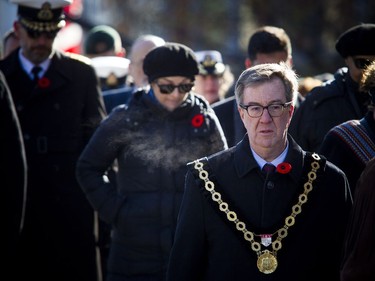 Mayor Jim Watson took part in a Remembrance Day ceremony at the National War Memorial in Ottawa on Sunday, November 11, 2018.
