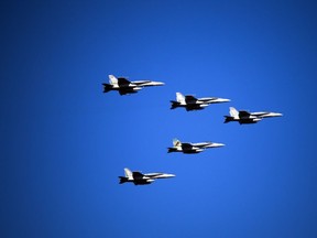 CF-18s from Cold Lake did a fly by during a Remembrance Day ceremony at the National War Memorial in Ottawa on Sunday, November 11, 2018.