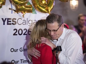 Mary Moran, Calgary 2026 CEO and chair Scott Hutcheson react at the Yes party to the news that Calgarians have voted against a 2026 Olympic bid on Tuesday November 13, 2018.