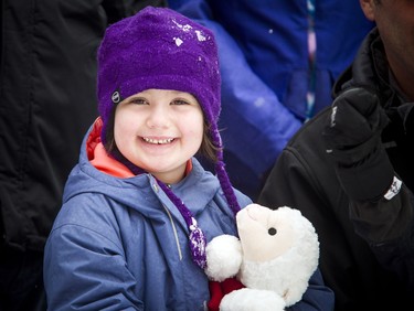 Six-year-old Mackenzie Green, who rang the bell at CHEO after beating leukaemia October 11, was all smiles before the 49th Annual Help Santa Toy Parade Saturday, November 17, 2018.  Ashley Fraser/Postmedia
