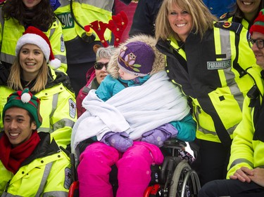 The Ottawa Paramedic Service paired up with two other organizations to bring CHEO patients to the 49th Annual Help Santa Toy Parade Saturday, November 17, 2018.  Ashley Fraser/Postmedia