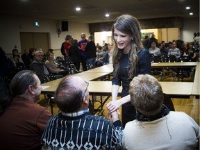 Tory MPP Amanda Simard addressed a crowded St. Isidore Recreation Centre about the proposed cuts to francophone institutions, Sunday, Nov. 25, 2018. Simard greet community members ahead of the discussion.   Ashley Fraser/Postmedia