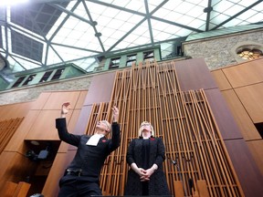 Speaker of the House of Commons, Geoff Regan, and Carla Qualtrough, Minister of Public Services enjoy the view from the Speaker's chair in Canada's interim House of Commons in the revamped West Block.