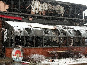 Wendy's restaurant in the Lincoln Fields mall caught fire Monday evening around midnight and firefighters were still suppressing the gutted building on Tuesday morning, making sure it didn't ignite again.