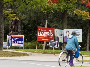 Municipal election signs dot Laurier Avenue in Ottawa on Oct. 1. So many candidates, so few voters at the ballot boxes ...
