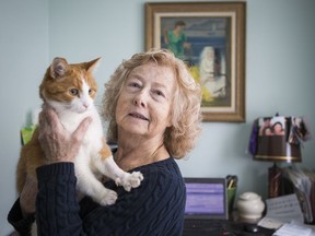 Pat Steenberg, seen here with pet cat Oscar, is organizing a forum at City Hall about how to encourage co-living arrangements as an alternative to retirement homes for 'moderate-income' seniors.
