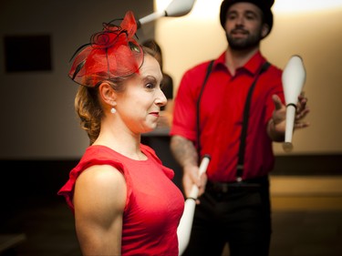 Karen Arseneault of Cirque Carpe Diem stands between two jugglers.