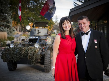 Esprit de Corps editor and publisher Scott Taylor with his wife Katherine Taylor standing in front of a 1963 Daimler Ferret Mk 2/3 armoured car.