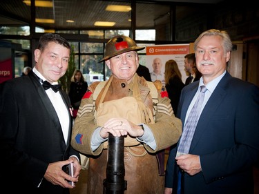 From left, Esprit de Corps editor and publisher Scott Taylor, reenactor captain Terry Hunter and Esprit de Corps editor Jim Scott.